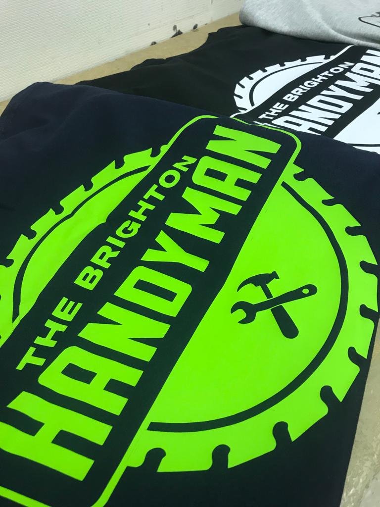 Green and black embroidered customer logo