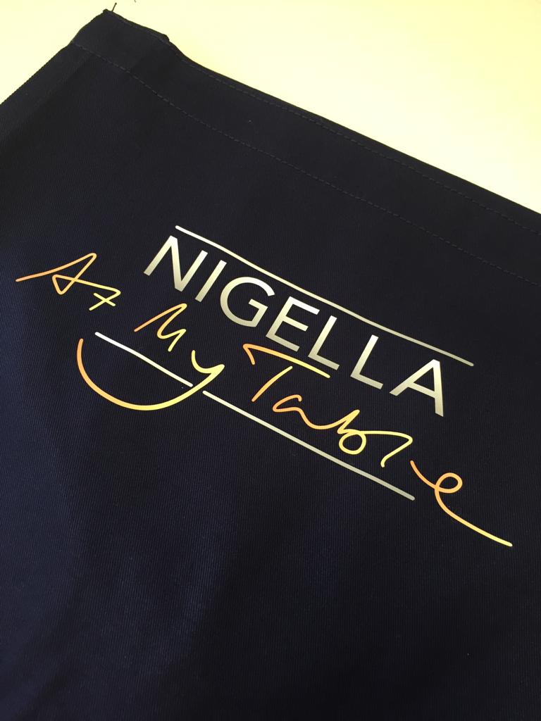 Printed customer branding on a dark garment